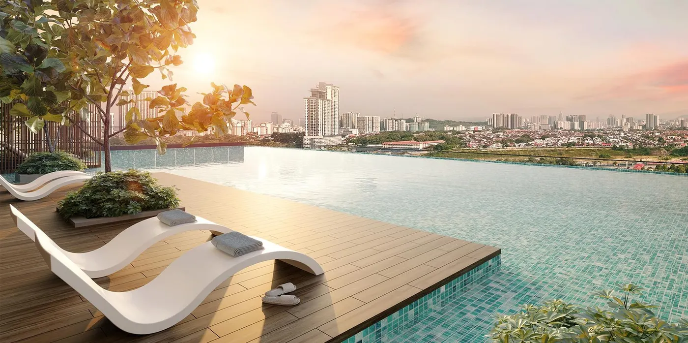 Infinity pool at Oaka overlooking the KL skyline at sunset